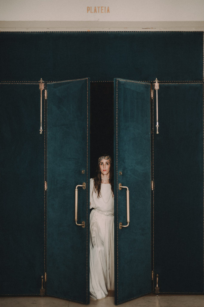 bride opening doors - brides inspiration wedding photographer