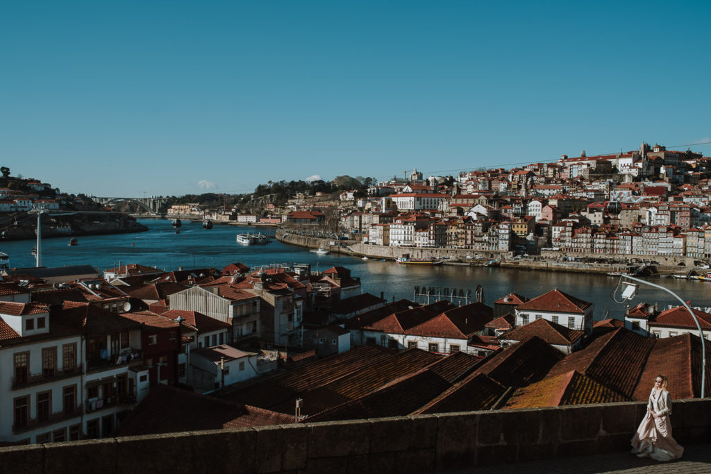 bride overviewing porto and douro river - brides inspiration wedding photographer