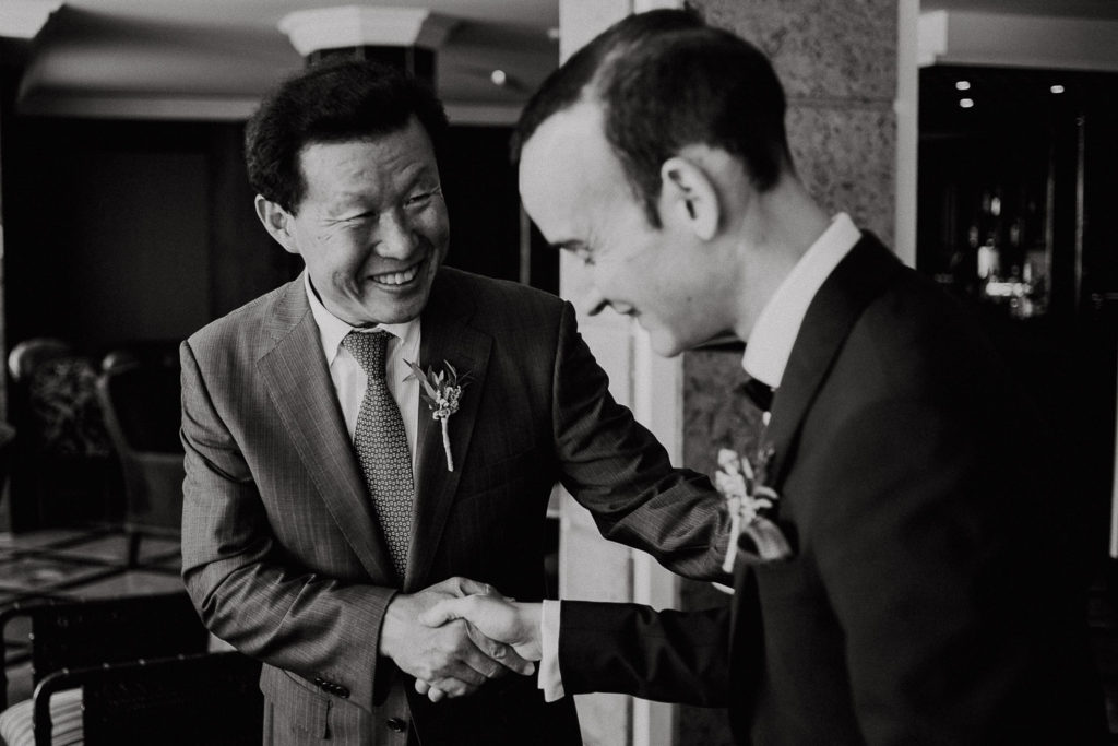 destination wedding cascais - groom greeting bride's family