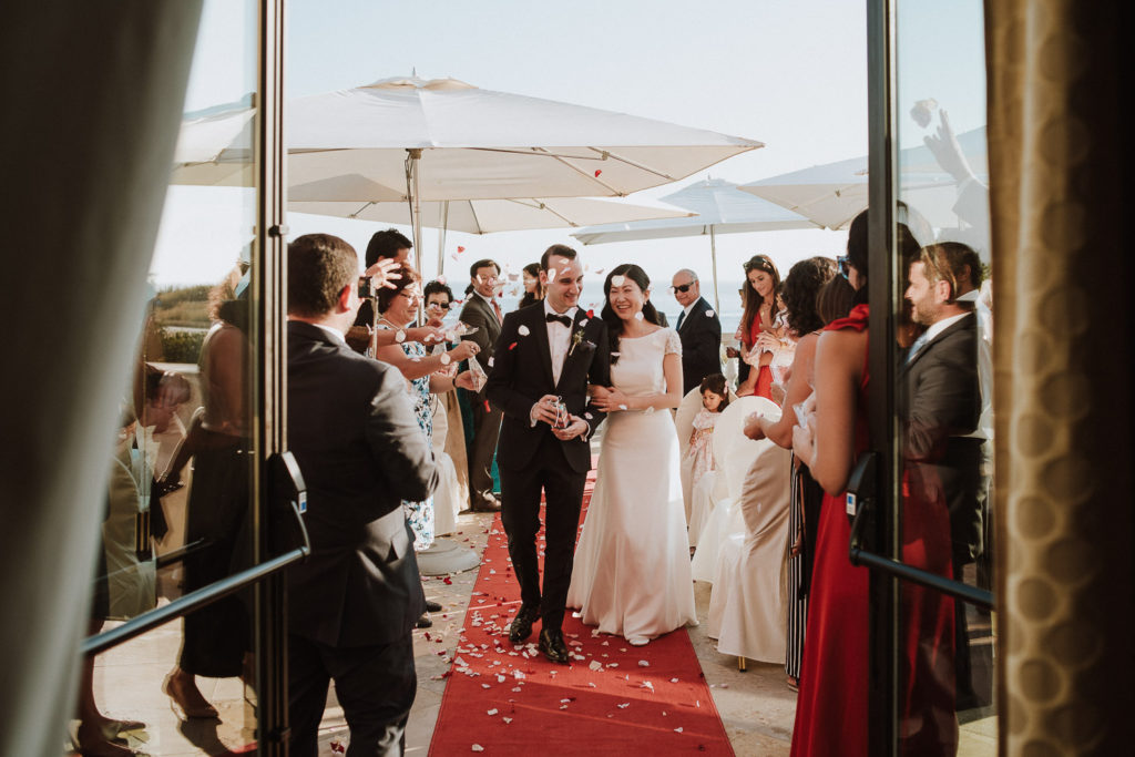 destination wedding cascais - couple leaving ceremony