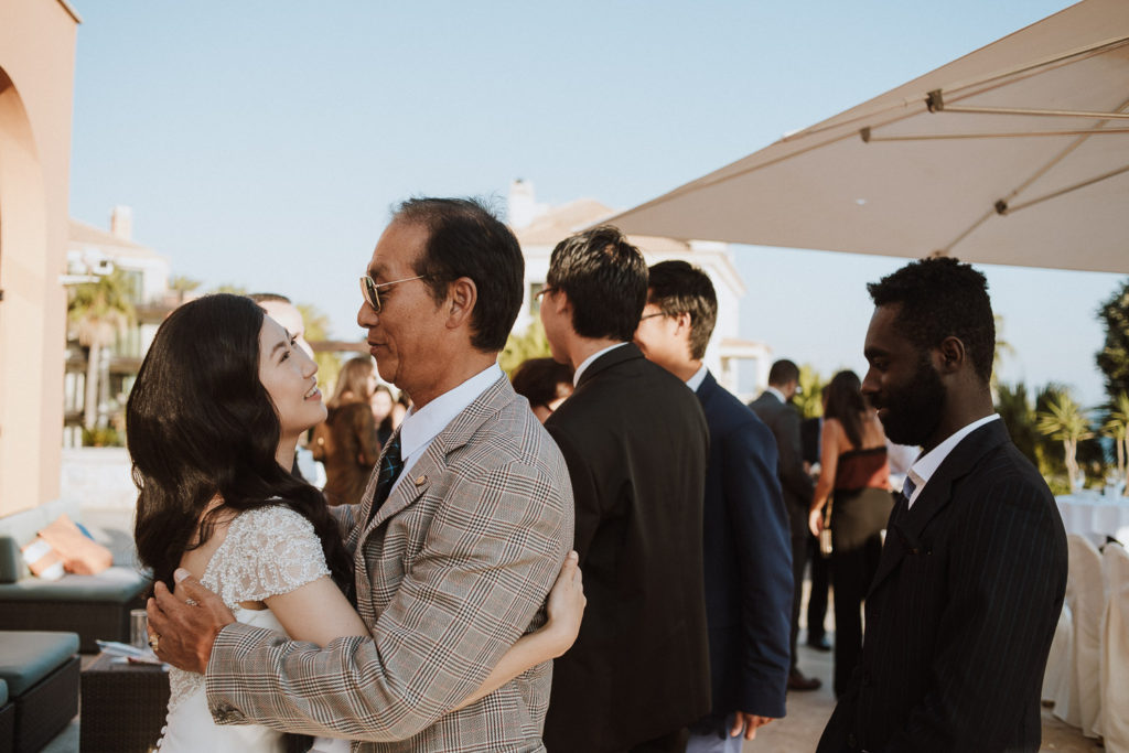 destination wedding cascais - couple greeting family