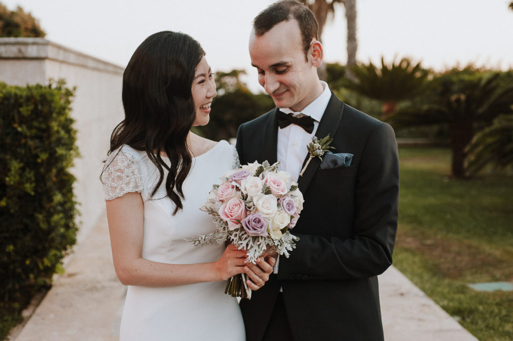 destination wedding cascais - couple talking about the bouquet