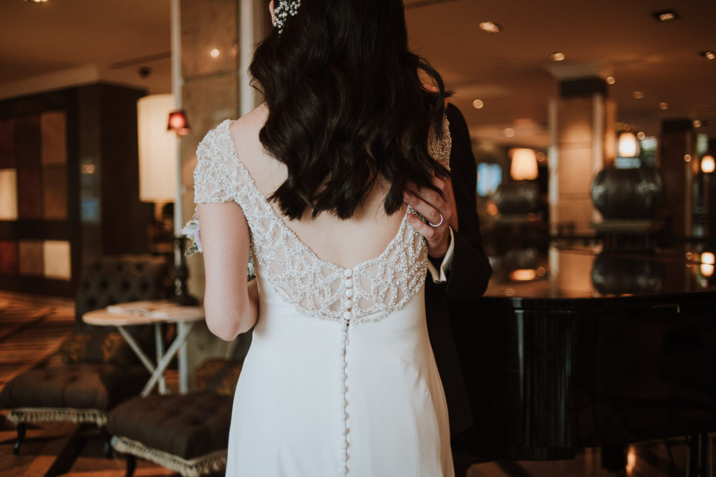 destination wedding cascais - detail of bride's back dress
