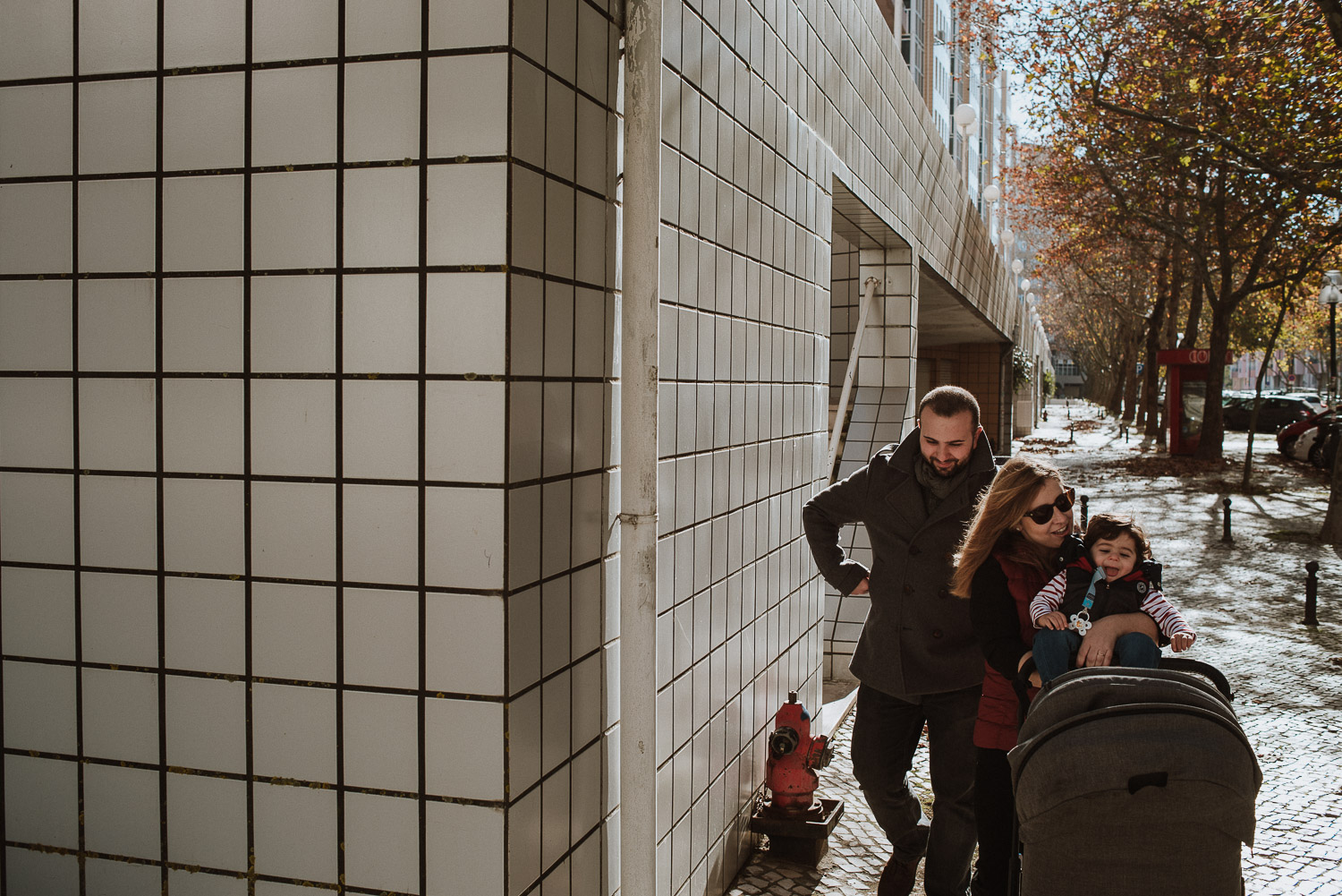 family going for a winter walk in the park - portugal wedding photographer family photographer