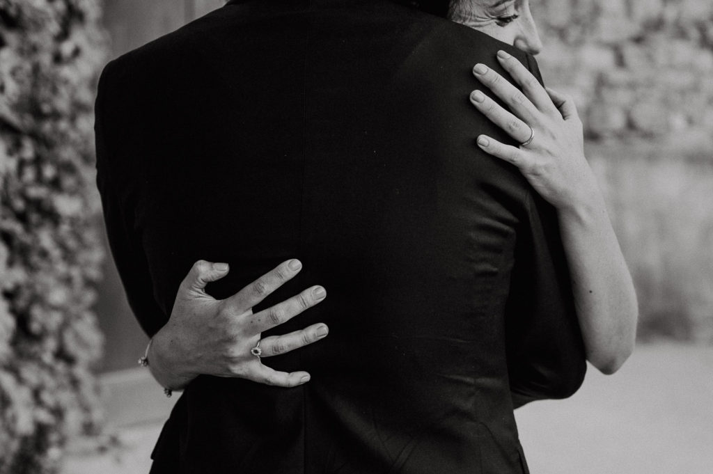 bride hugging groom - solar de pancas wedding photographer