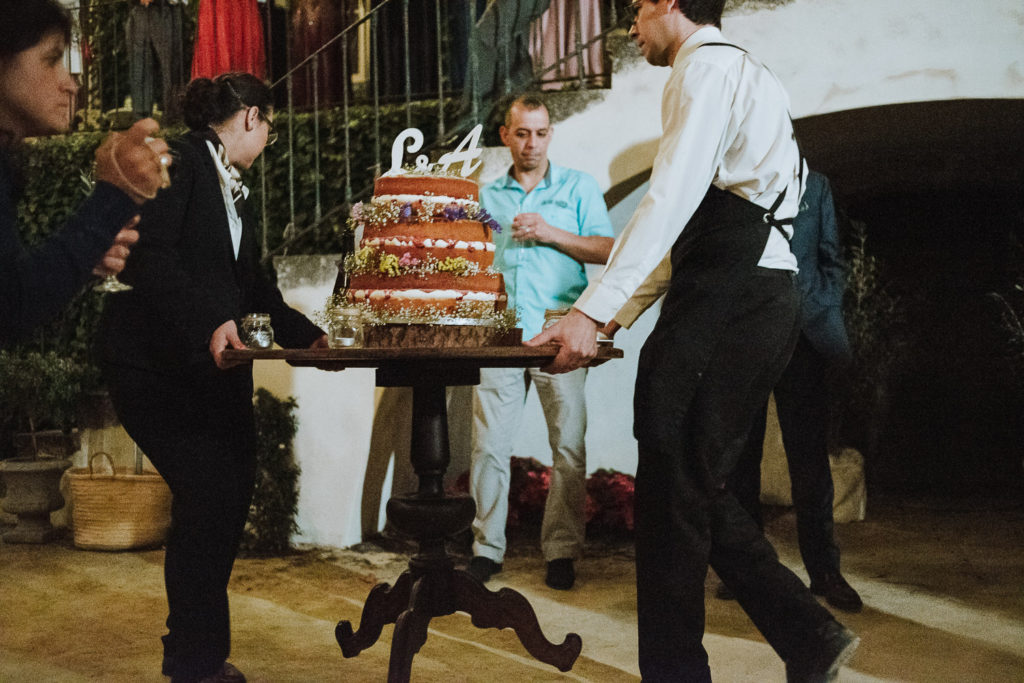 cake being taken away - solar de pancas wedding photographer
