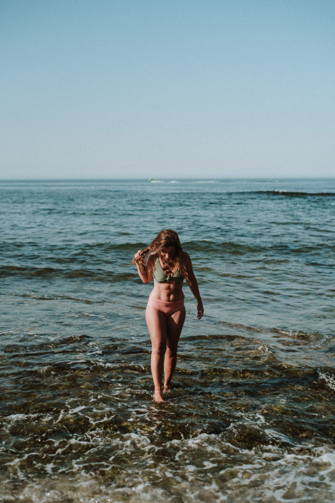 fashion photographer praia da parede - girl heading for a swim